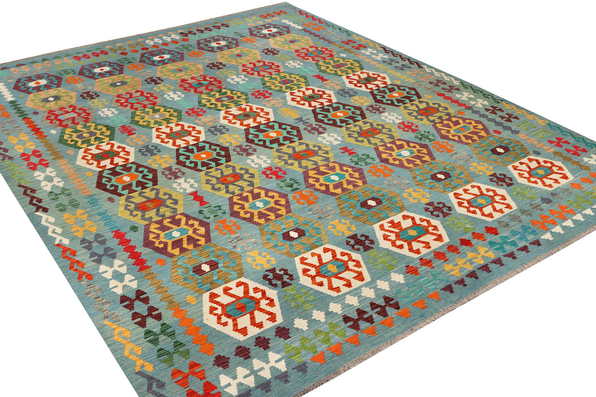 A Kilim carpet, c. 392 x 312 cm.