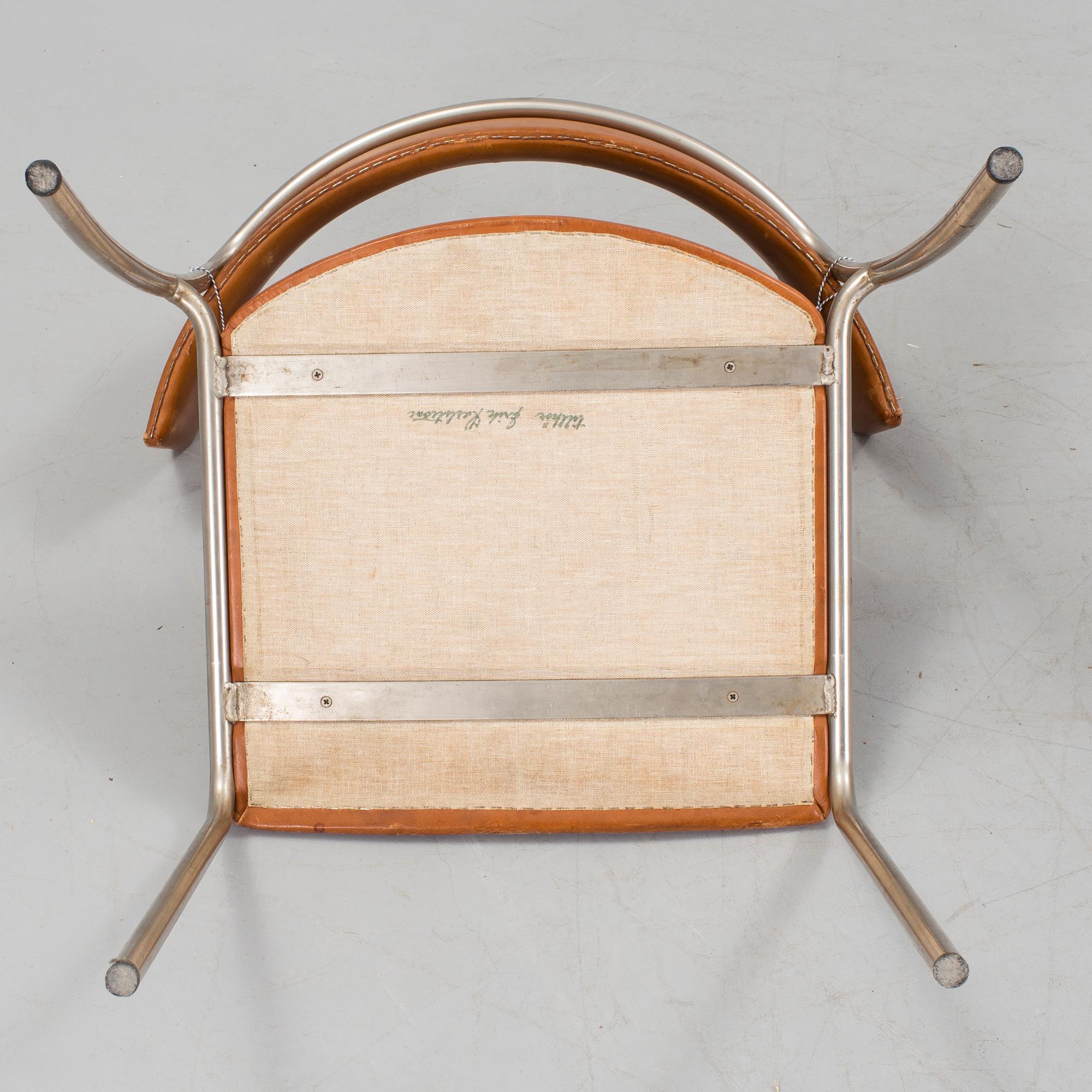 A pair of Erik Karlström leather upholstry chairs, circa 1965.