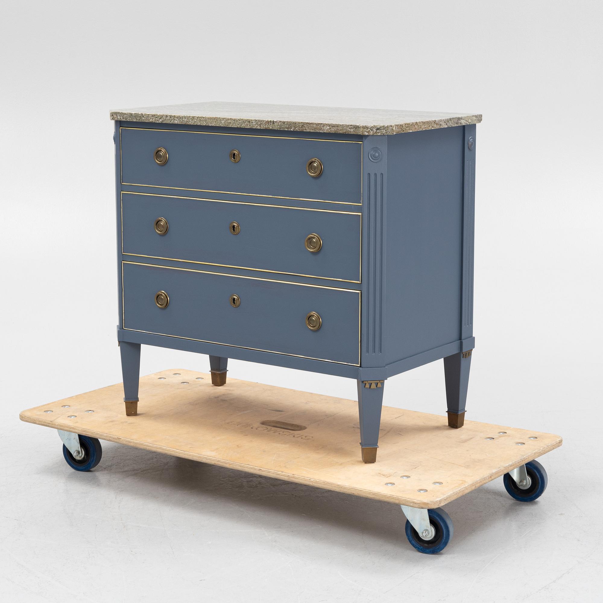A Gustavian style chest of drawers, mid 20th Century.