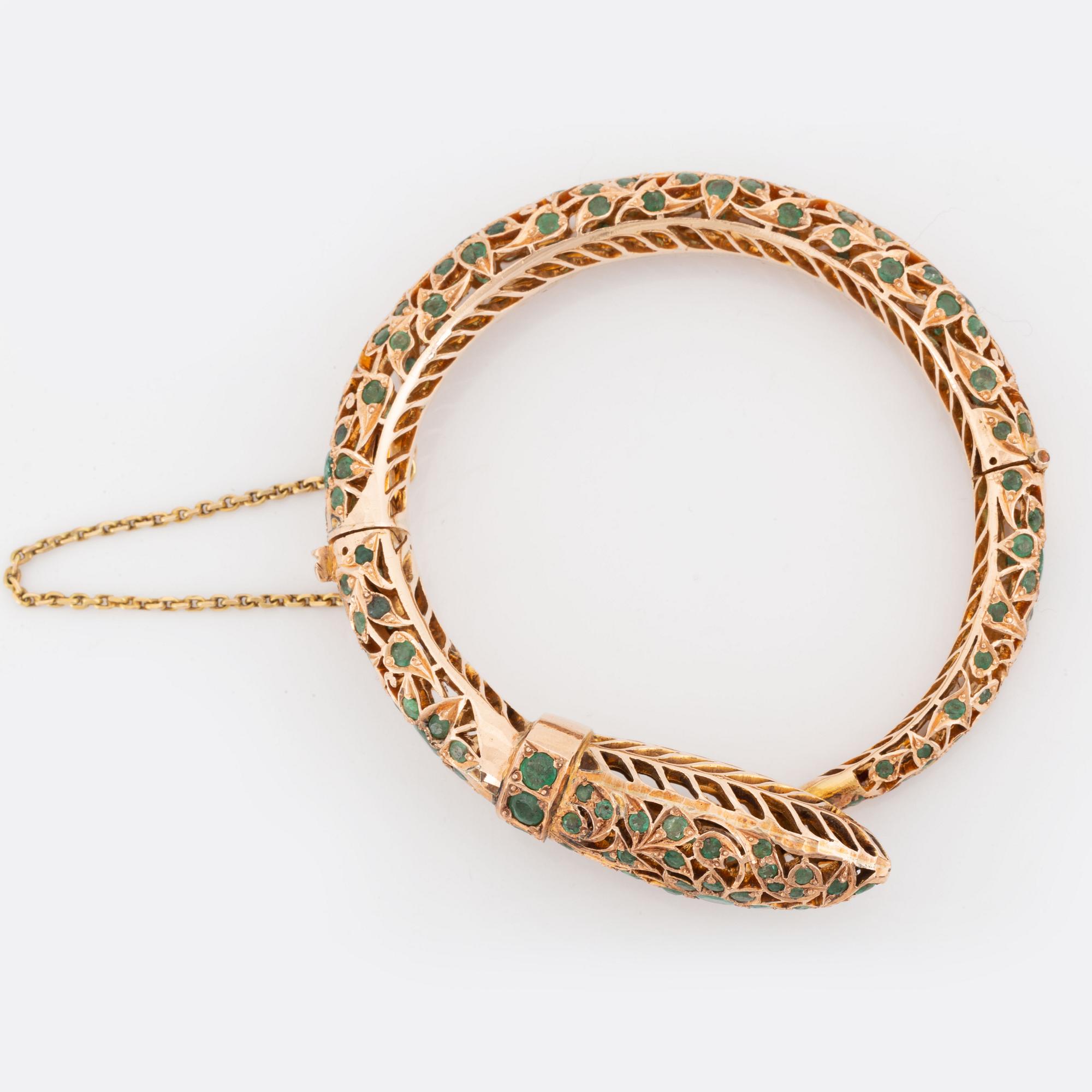 Armring,  i form av orm 14K guld med smaragder.