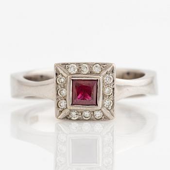 Ring, 18k white gold with a carré-cut ruby and brilliant-cut diamonds.