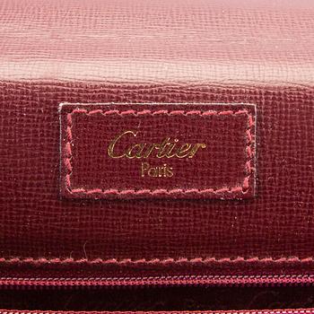 A Cartier leather briefcase.