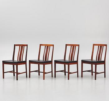 Bertil Fridhagen, a rosewood-veneered dining table with four chairs, BOdsfors, Sweden, 1960's.