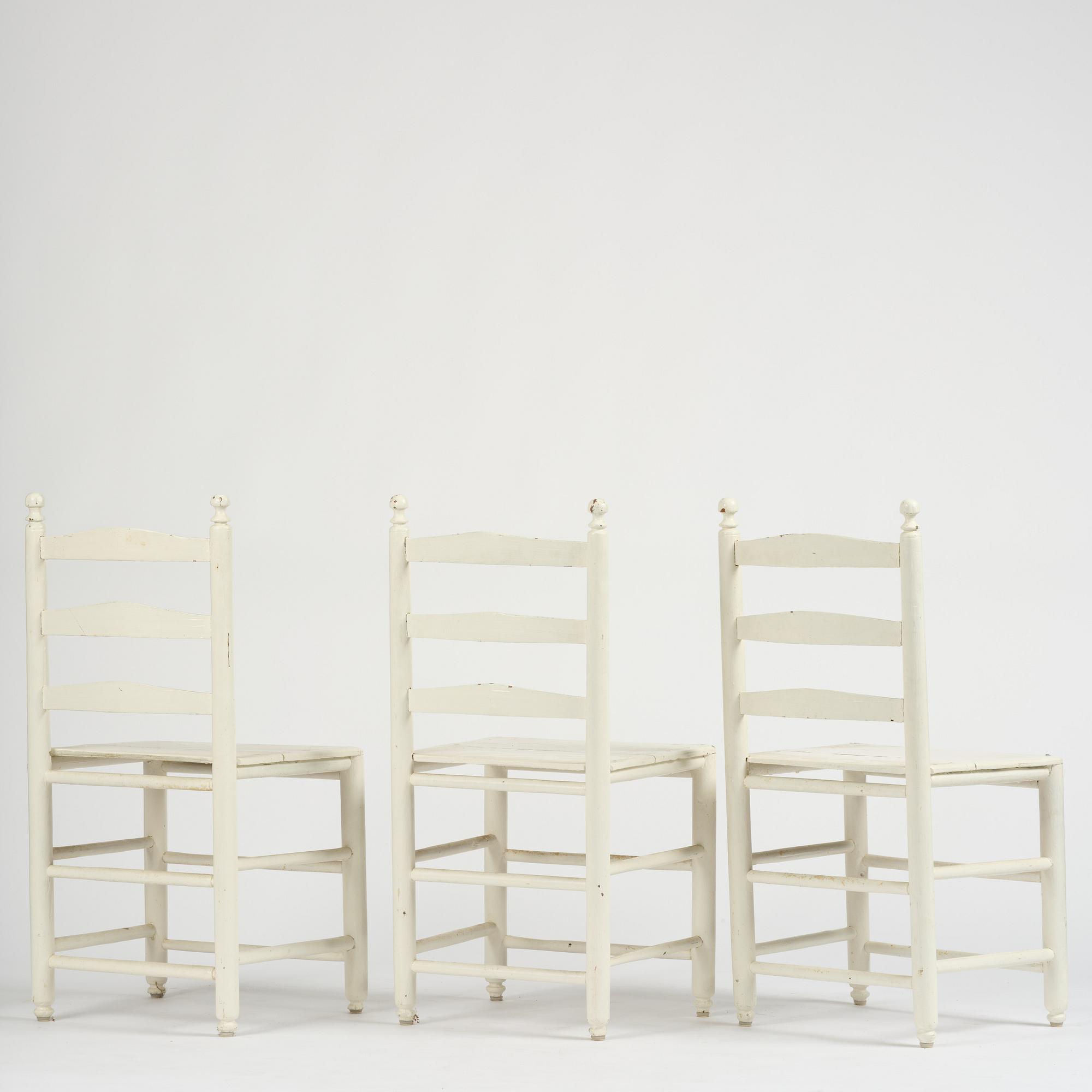 A set of three Gustavian ladderback chairs, late 18th/ early 19th century.