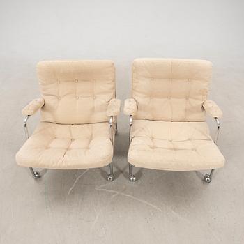 Bruno Mathsson, a pair of "Karin" armchairs for DUX, late 20th century.