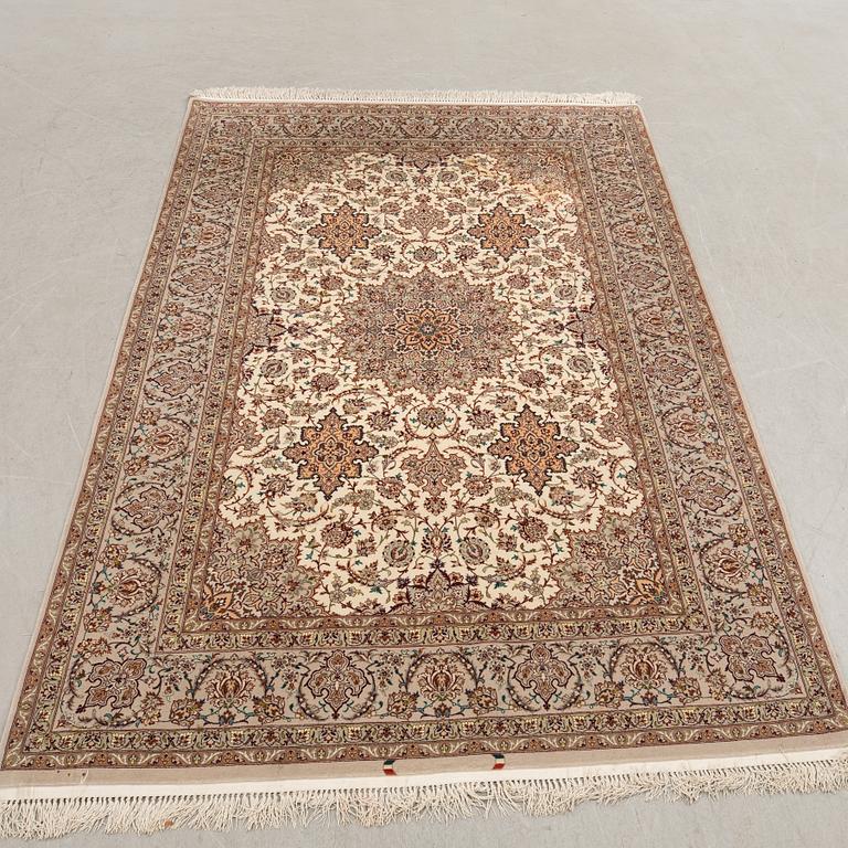 An Isfahan rug, central Persia, signed, 228 x 150 cm.