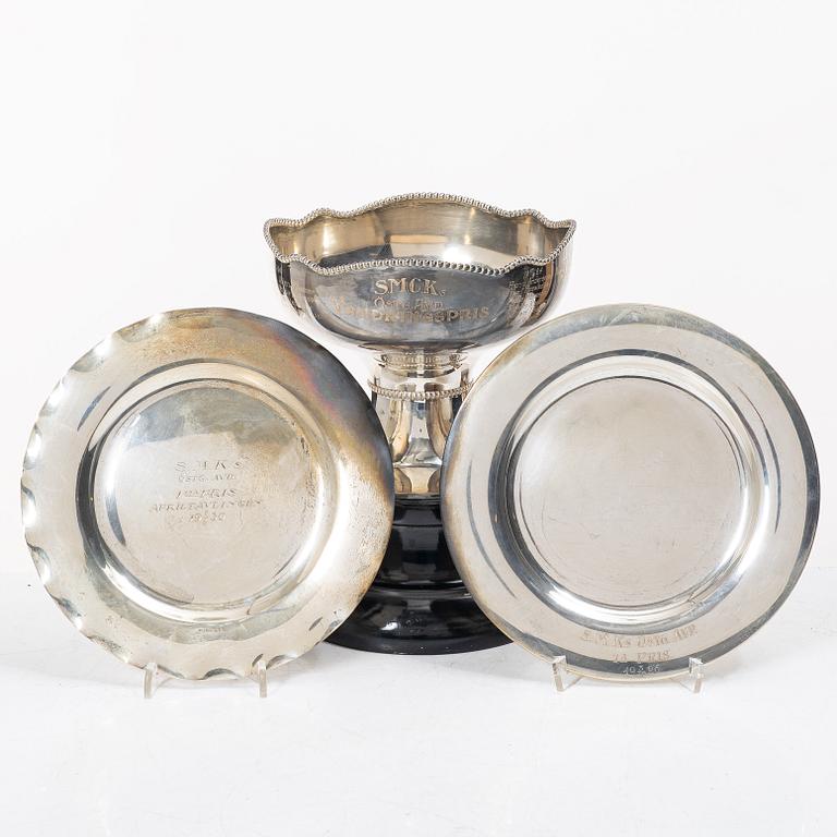 A cup and two plates, silver, second half of the 20th century.