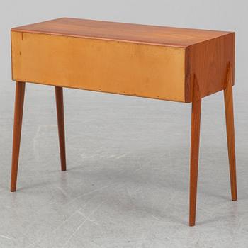 RIMBERT SANDHOLT, a teak veneered sideboard.