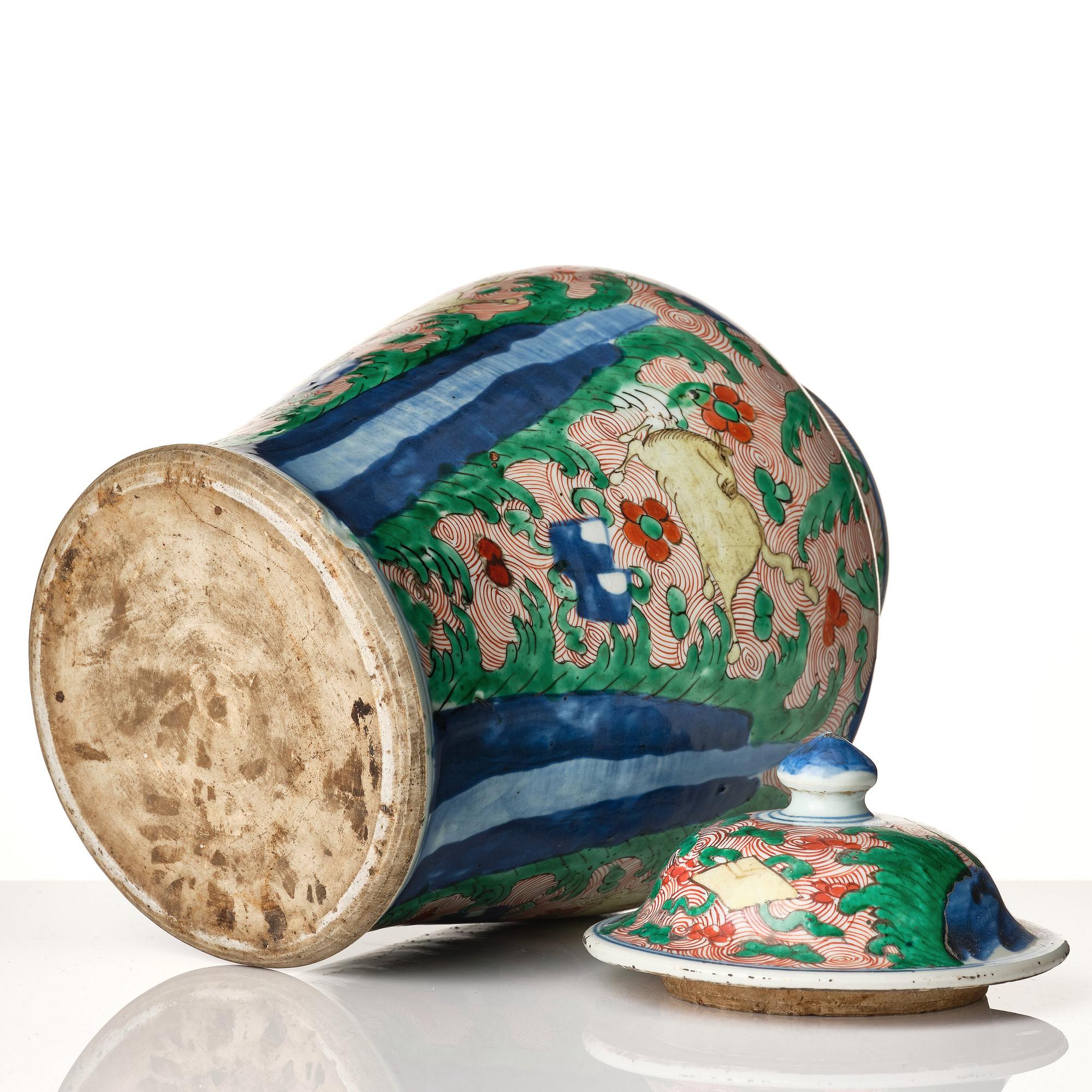 A pair of Transitional Wucai jars, 17th Century.