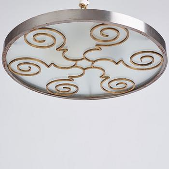 Lars Holmström, a Swedish Grace brass and steel framed ceiling light, Arvika 1920-30s.