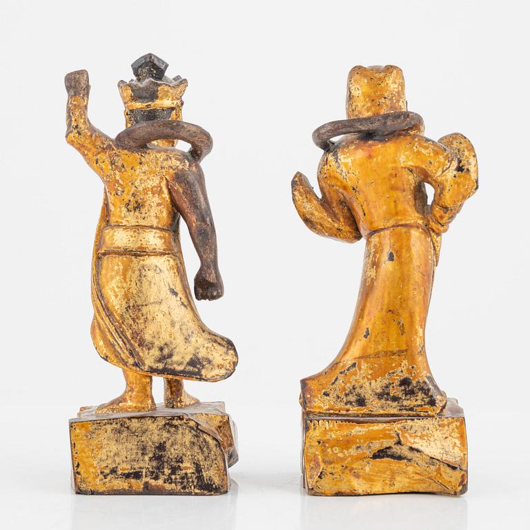 Two wooden figures of guardsmen, Qing dynasty, 19th Century.