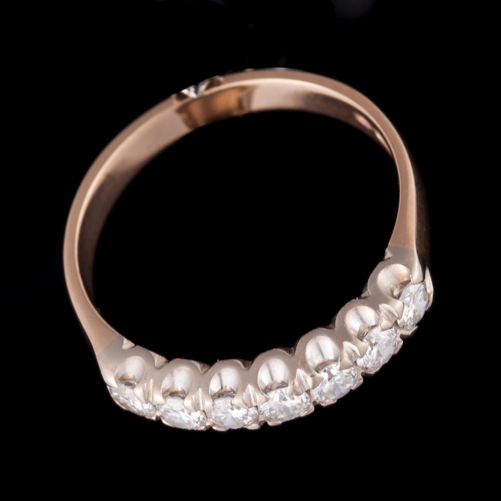 ALLIANSRING, 14K guld, 7 briljantslipade diamanter tot. 0,63 ct, kontrollstämpel 1987. Vikt 3,2 g.