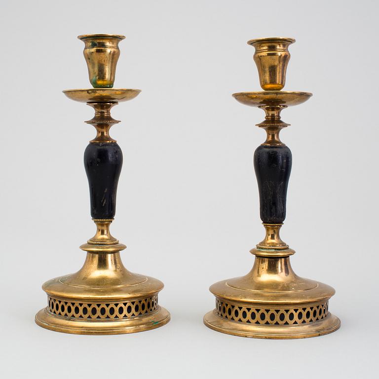 A pair of Skultuna brass candlesticks, early 20th Cenury.