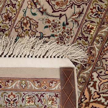 An Isfahan rug, central Persia, signed, 228 x 150 cm.