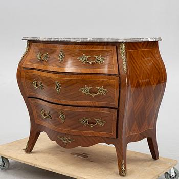 A Rococo style chest of drawers, first half of the 20th century.