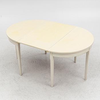 A Gustaivan style dining table/ two crescent shaped tables, end of the 19th century.