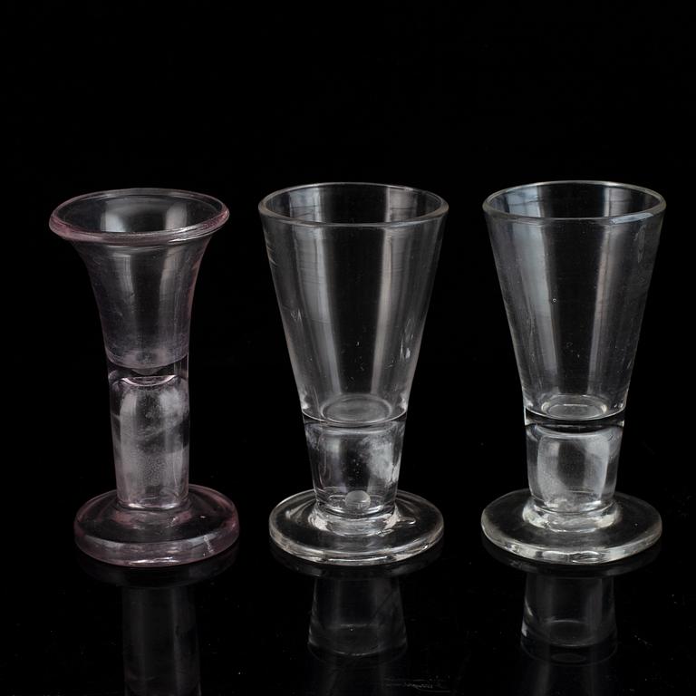 Six similar 18th century wine glasses.