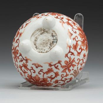 A red lotus tripod brush washer, Qing dynasty, 19th Century.