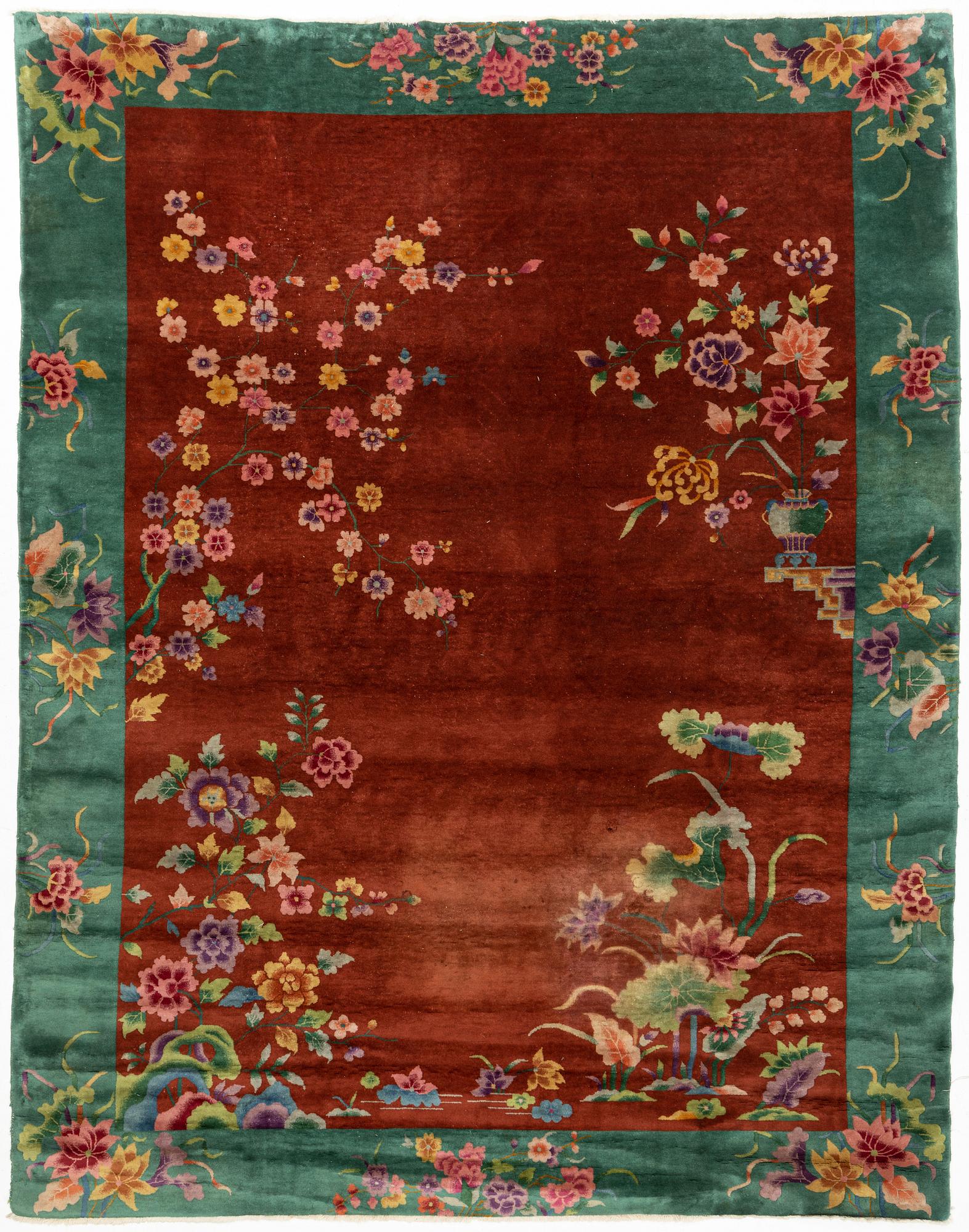 A semi-antique chinese carpet, ca 338 x 266 cm.
