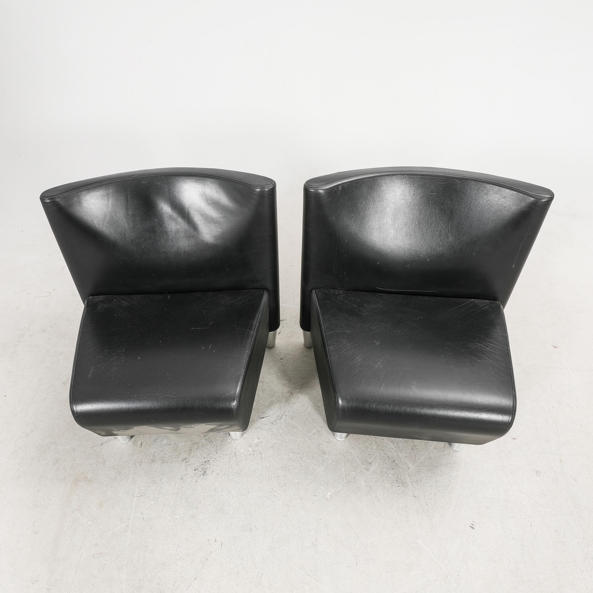 A set of eight leather easychairs by Erik Jørgensen Møbelfabrik, Svendborg, Denmark.