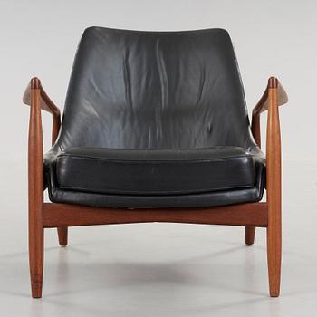 Ib Kofod-Larsen, a 'Seal' teak and black leather armchair, Olof Persson Möbler, Jönköping, Sweden 1950's-60's.