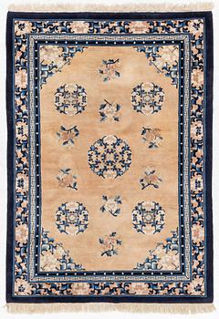 A semi-antique chinese rug, c. 195 x 132 cm .