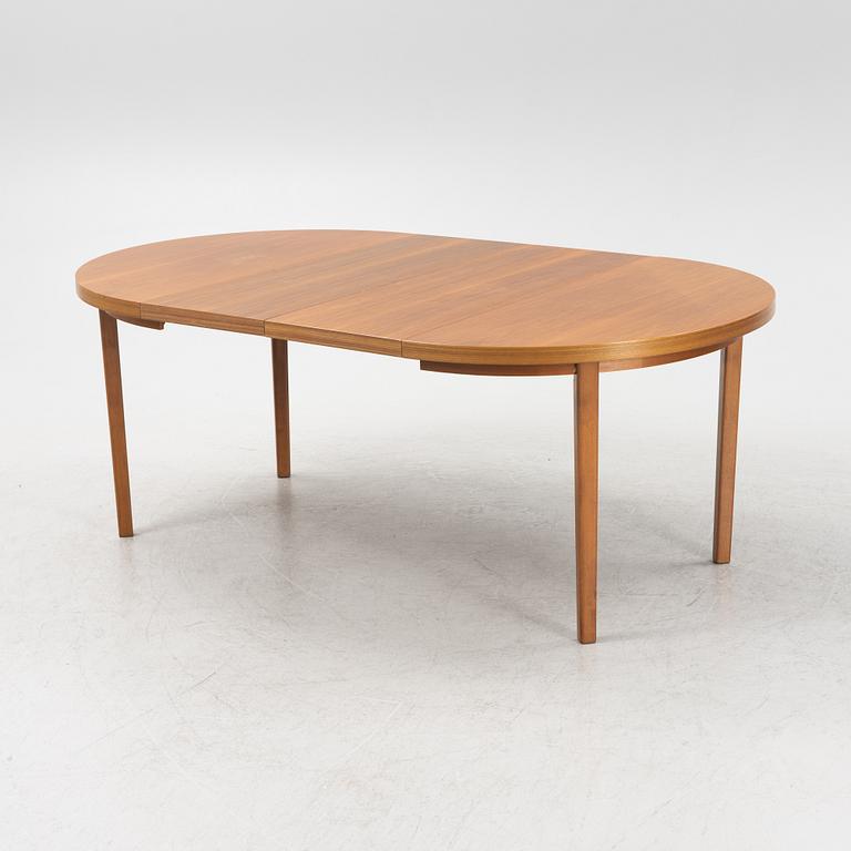 A round teak dining table, second part of the 20th Century.