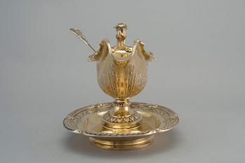 A SAUCE-BOAT WITH LADLE, 84 silver. Gilt. Nichols & Plincke, purveyer of the court, St. Petersburg 1859. Weight 1600 g.