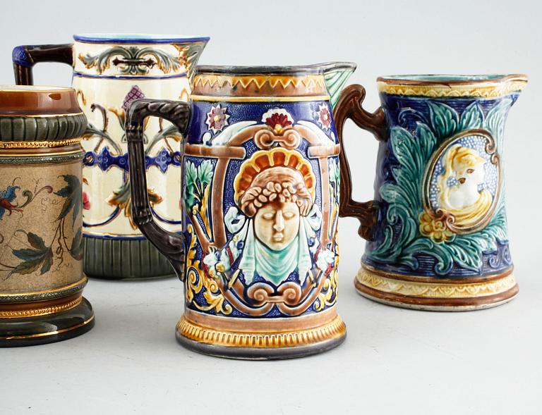 Three majolica jugs from Rörstrand and three majolica pitchers from late 19th century.