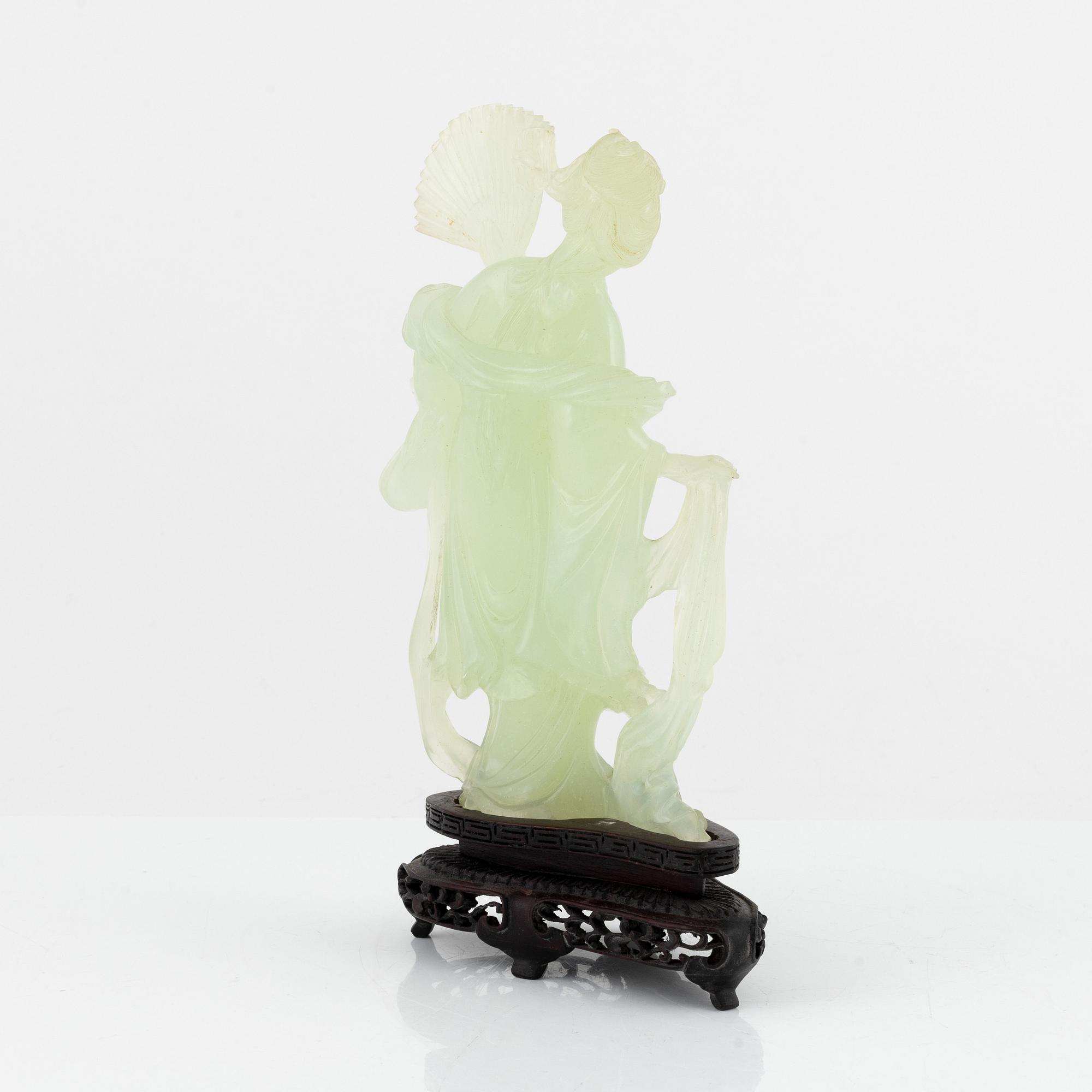 A Chinese stone scultpure of an elgegant lady, 20th Century.