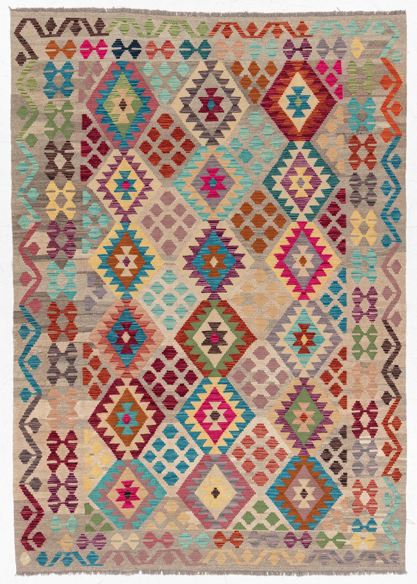 A Kelim rug, c. 252 x 180 cm.