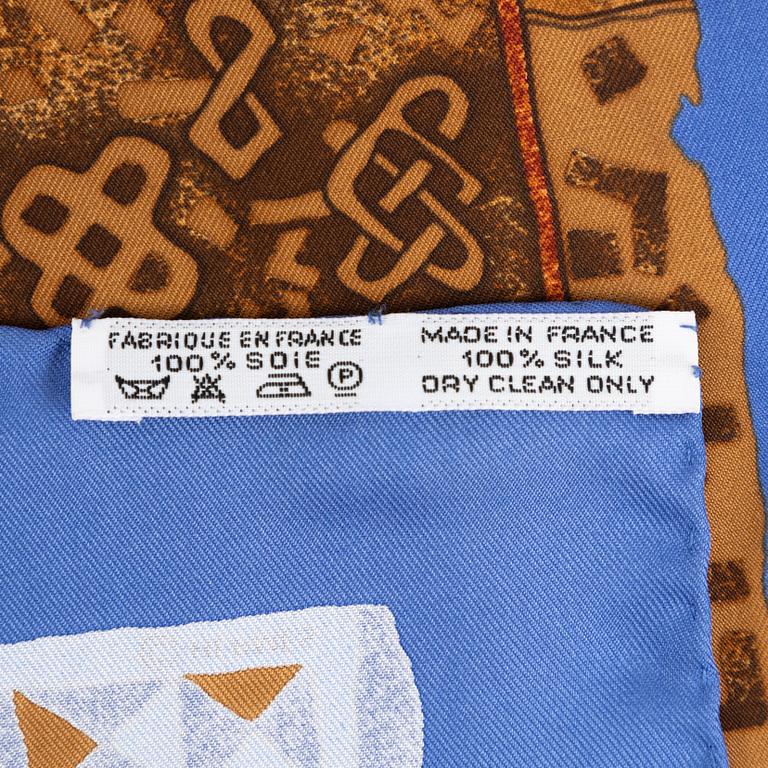 Hermès, a 'Persona' twill silk scarf.