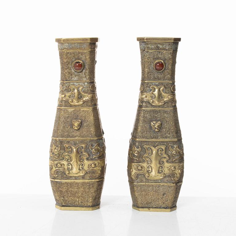 A pair of Chinese gilt bronze vases, Qing dynasty (1644-1912).