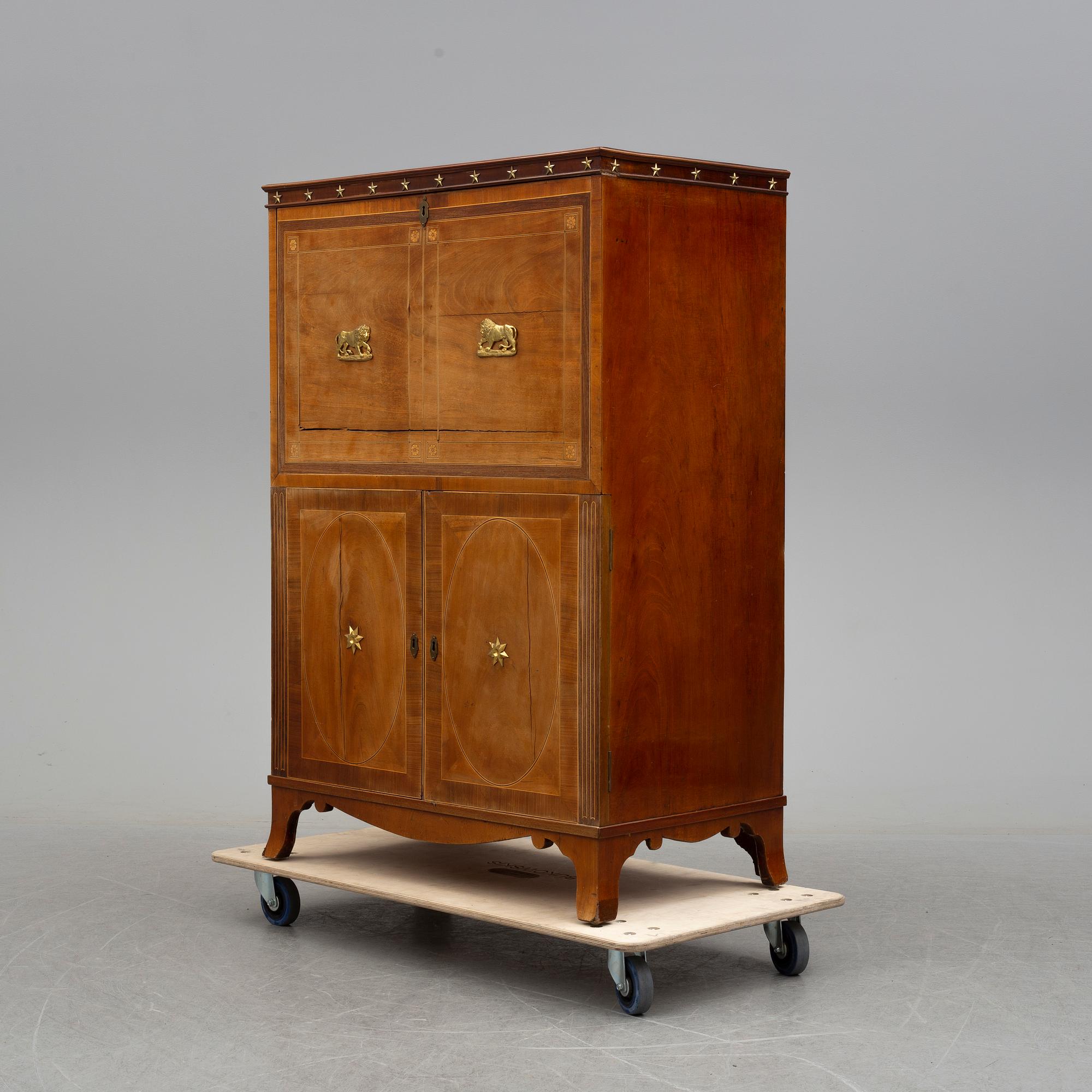 A northern european empire chiffonier, first half of the 19th century.