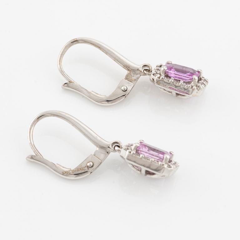 A pair of earrings in 18K white gold with pink sapphires and round brilliant-cut diamonds.