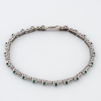 A emerald and single cut diamond bracelet.
