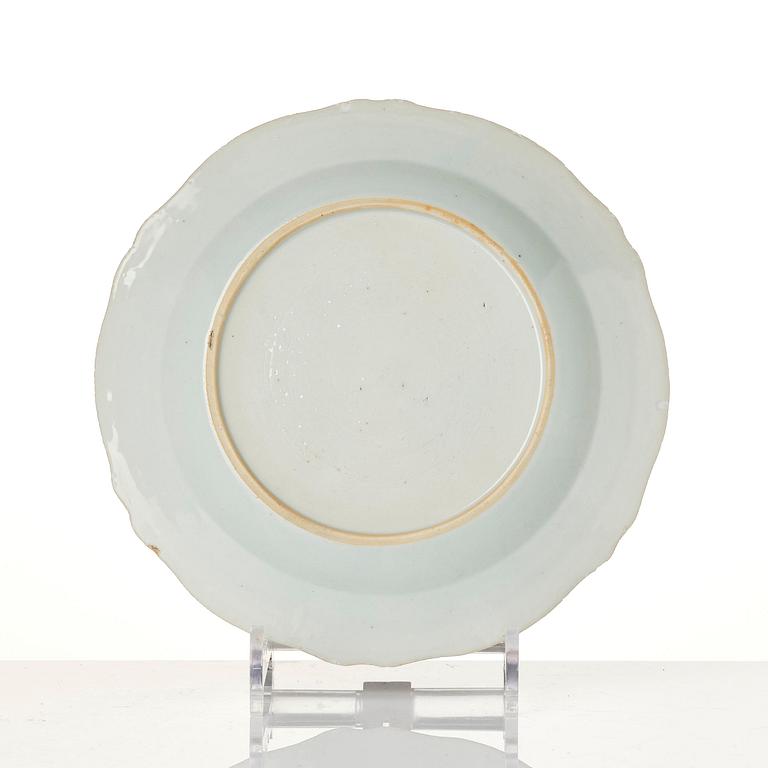 A group of famille rose 'double peacock' serving dishes, Qing dynasty, Qianlong (1736-95). (8 pieces).