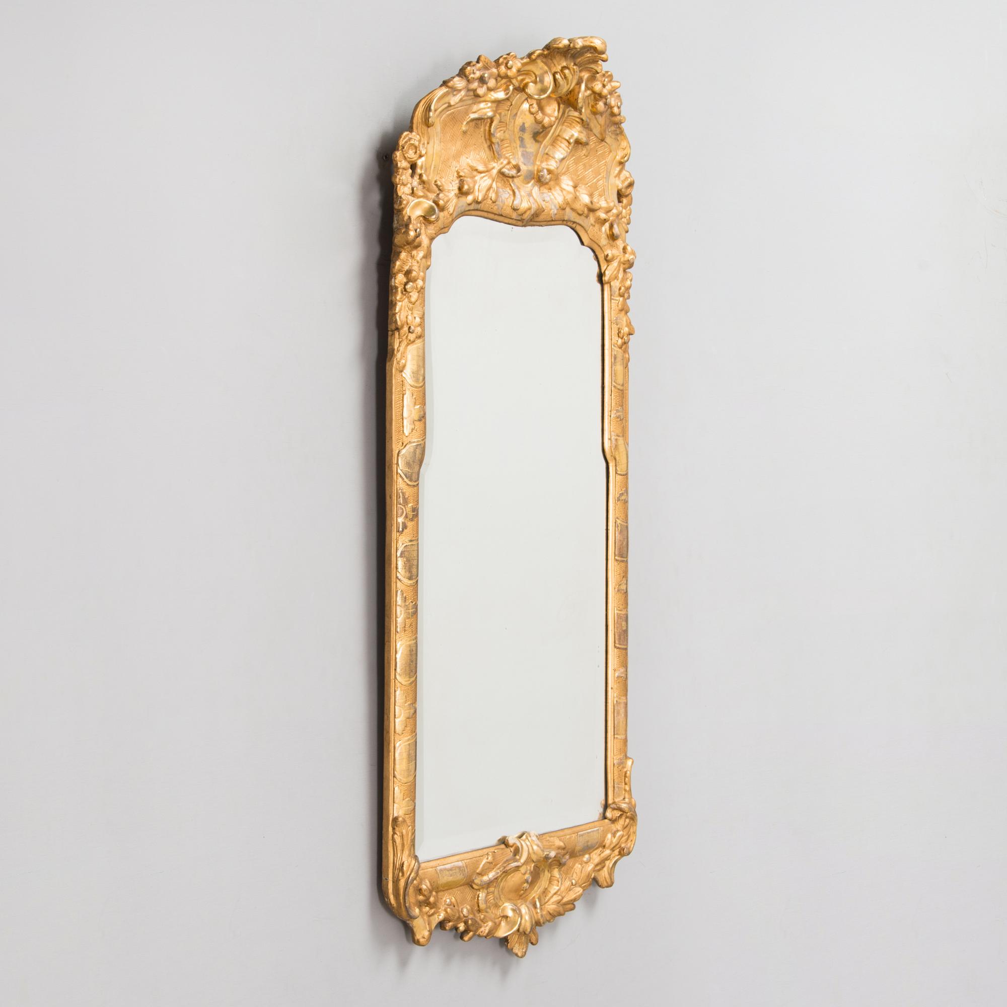 A late 18th century Swedish Rococo mirror.