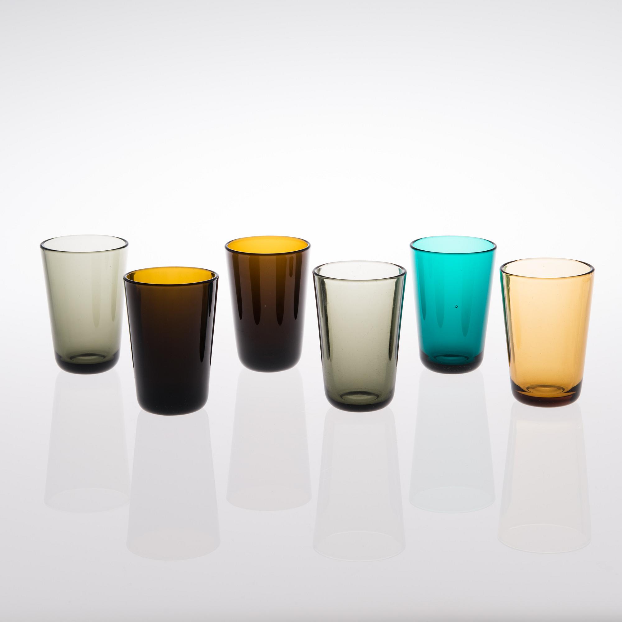A set of 32 glasses and a pitcher in pressed glass, Nuutajärvi Finland.