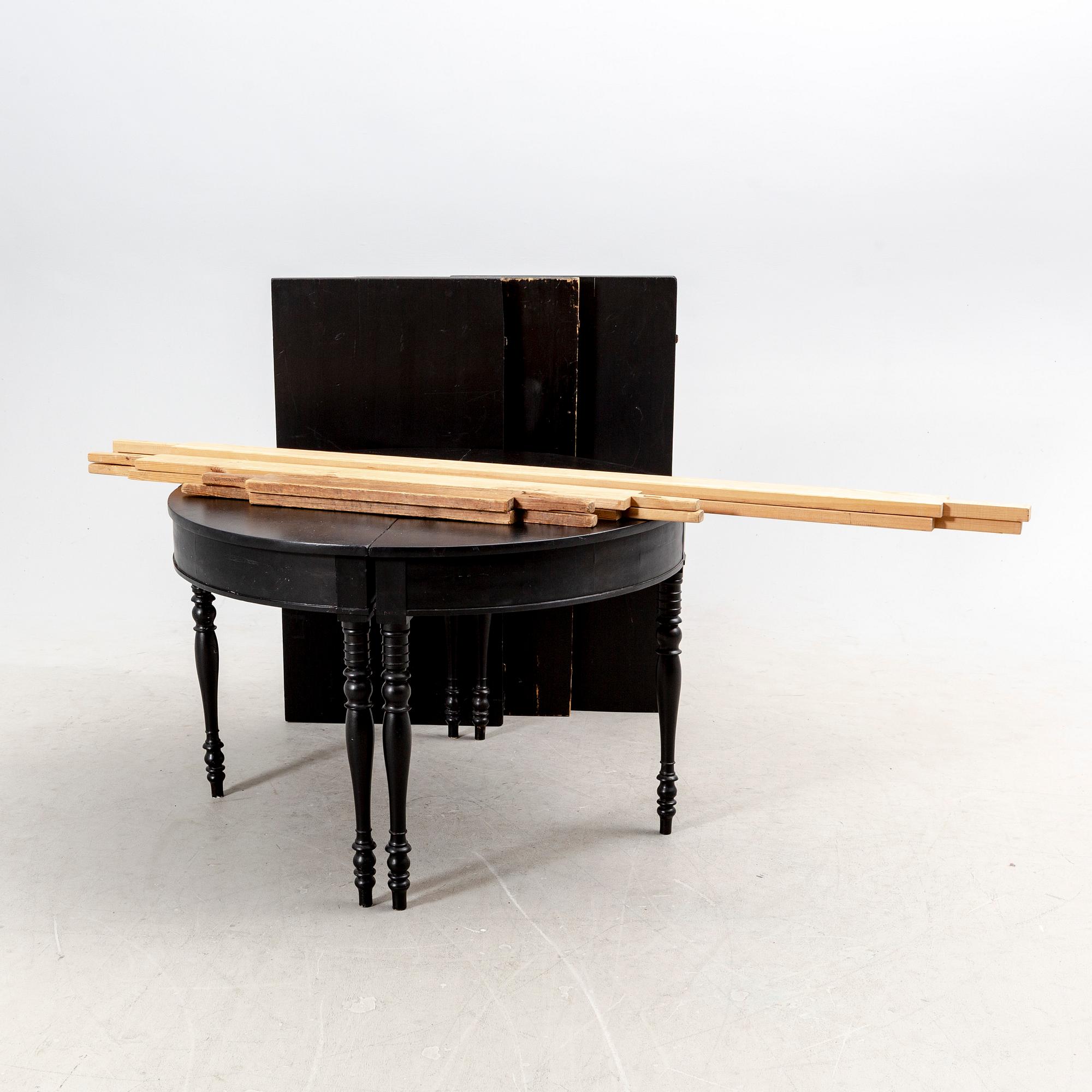 A mid 18th century painted dining table.