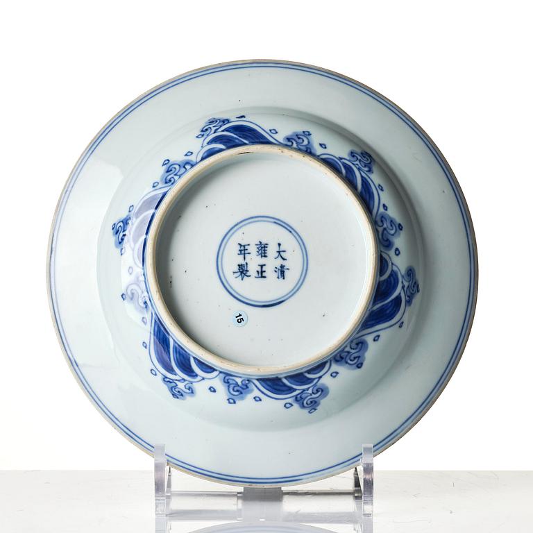 A blue and white 'dragon' dish, Qing dynasty with Yongzheng mark and of the period (1723-35).