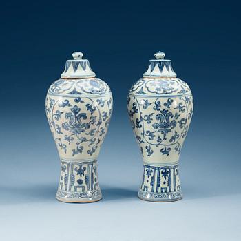 A pair of blue and white 'Meiping' vases with cover, Ming dynasty.