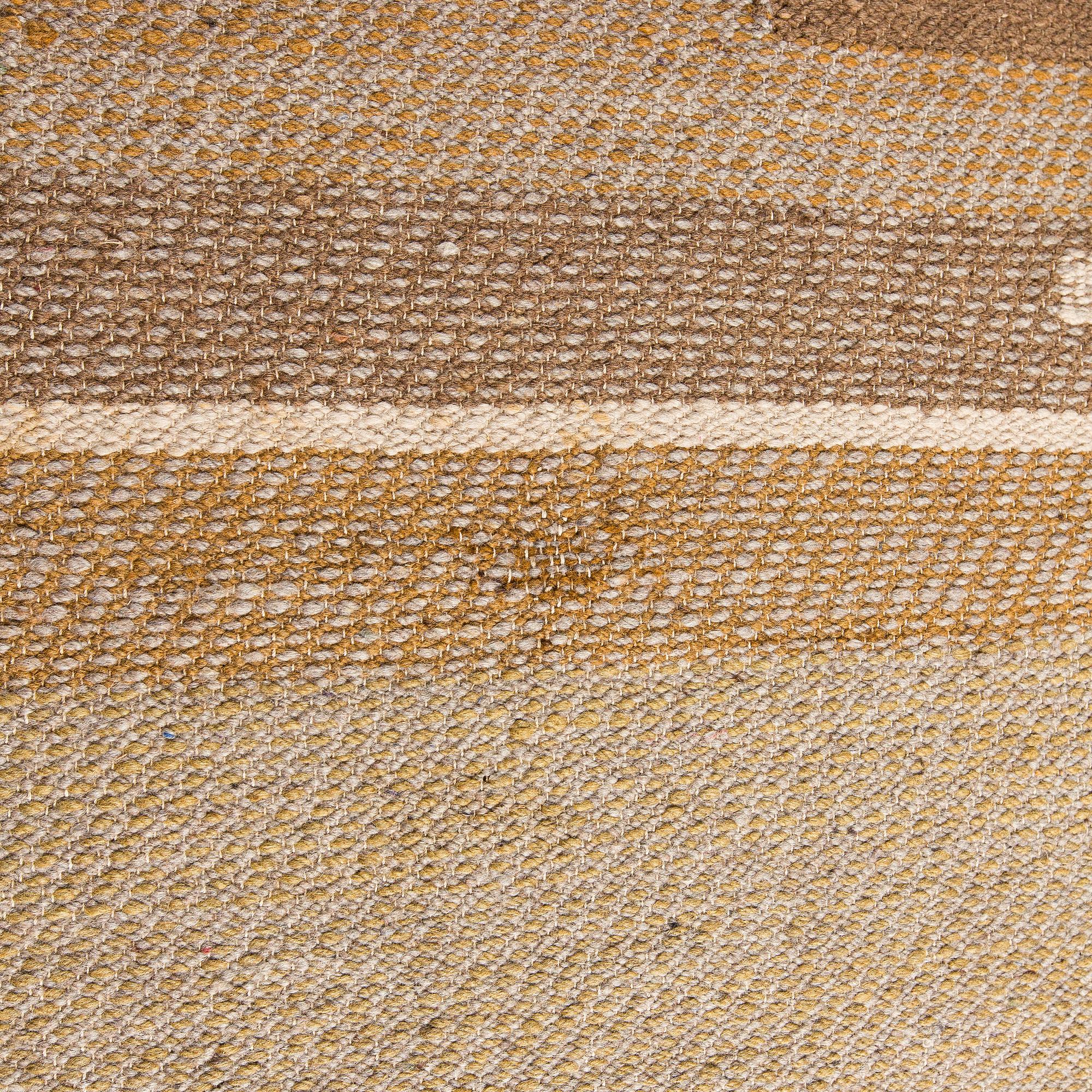 A 1930s finnish flat weave carpet, approximately 430 x 270 cm.