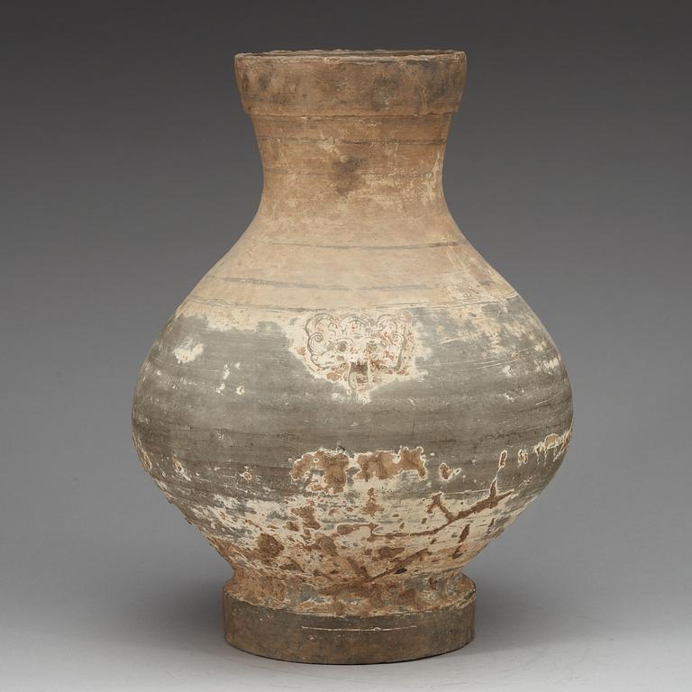 A unglazed jar, Han dynasty, (206 BC - 220 AD).