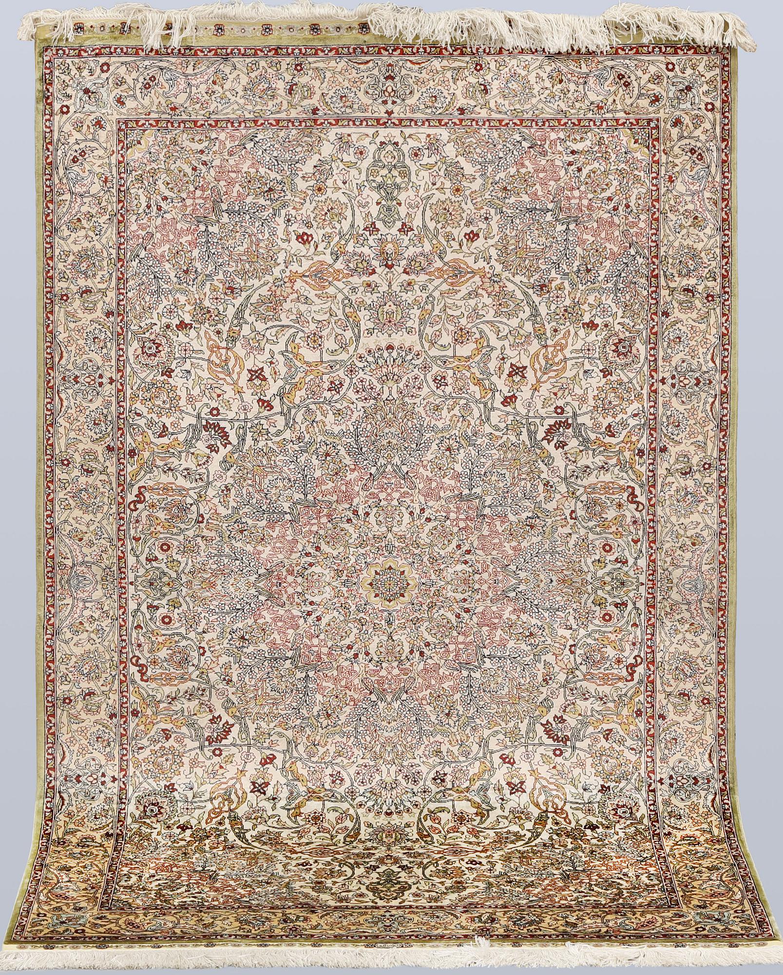 An Oriental silk rug, approx. 153 x 95 cm.