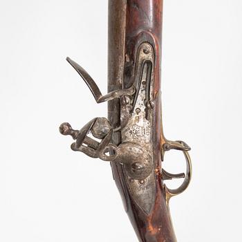 A British Tower and I Salter flintlock musket and bayonet, first half of the 19th century.