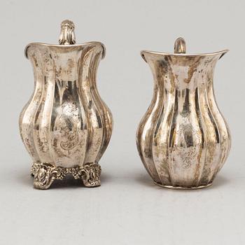 Two Swedish mid 19th century silver cream jugs.