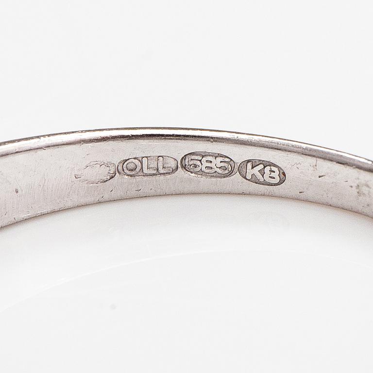 Sormus, 14K valkokultaa, timantteja n. 0.66 ct yht. Suomalaiset tuontileimat 1987.