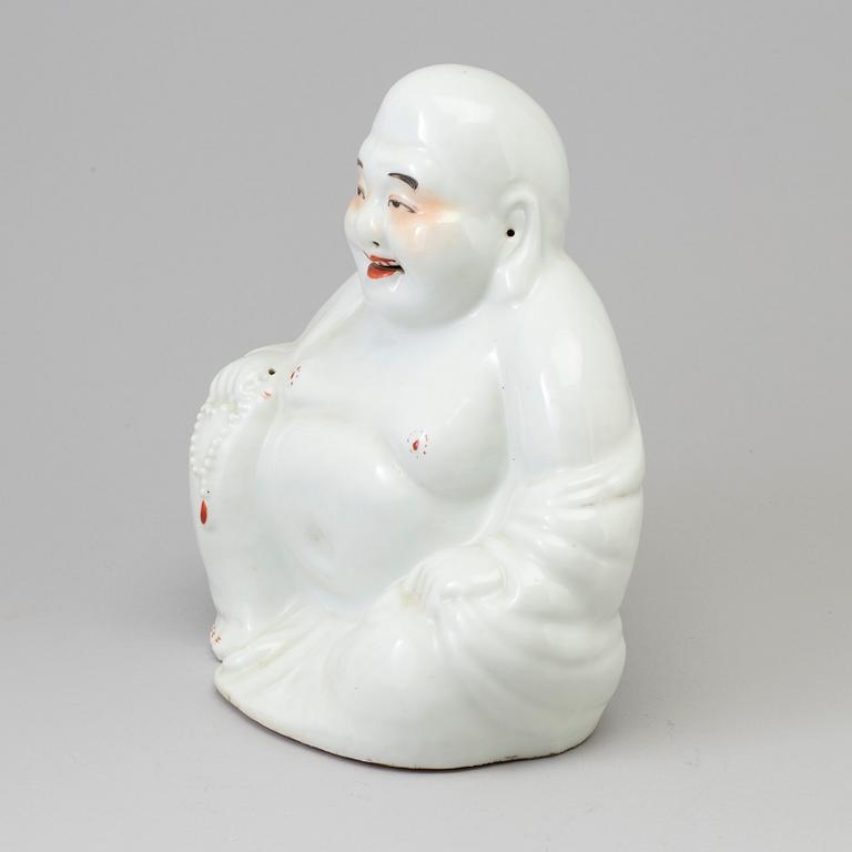 A Chinese porcelain Buddhai, 20th century.