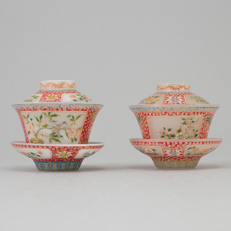 Two chinese peking glass wedding cups with cover and dishes, 20th century, with Qianlongs mark to the base.
